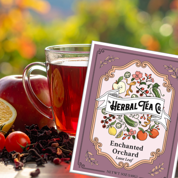 Herbal tea package with a cup of tea and tea leaves on a blurred natural background