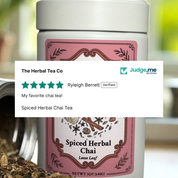 Spiced Herbal Chai tea canister with visible brand and five-star product review.
