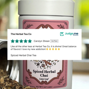 Spiced Herbal Chai tea packaging with a positive five-star review from Judge.me